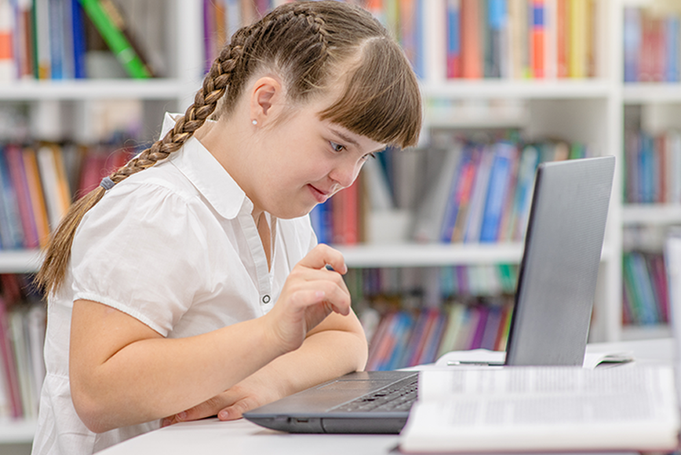 Student learning on a laptop.
